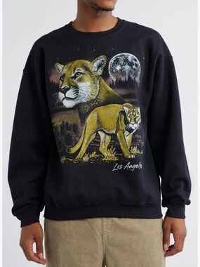 Junk Food Clothing Black Crewneck with Golden Cougar Graphic